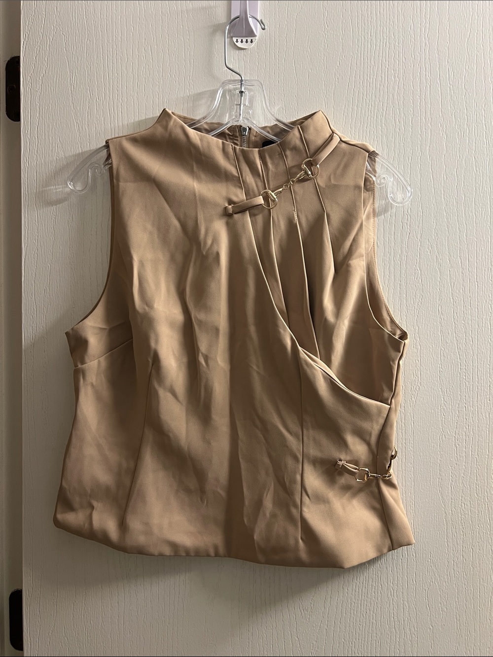 Sleeveless Beige Mock Neck Blouse with Gold Chain Accents
